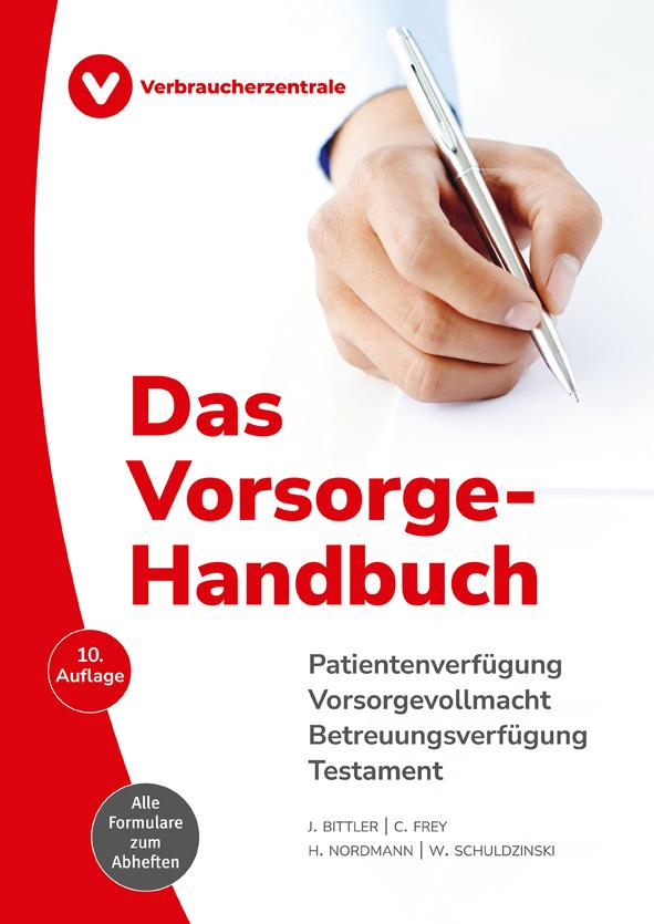 Hand mit Kugelschreiber unterschreibt ein Formular